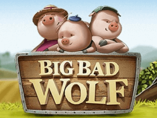 Die drei kleinen Schweinchen neben einem hölzernen Big Bad Wolf Schriftzug