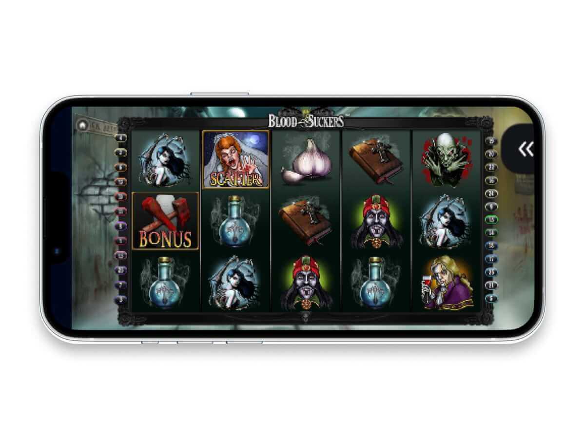 Mobile phone in landscape mode with Blood Suckers on its screen